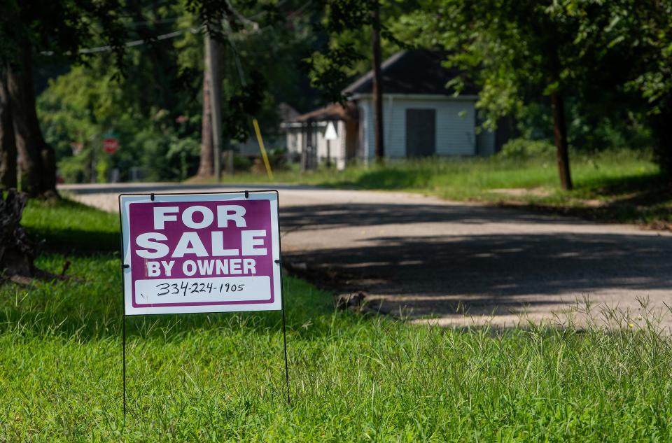 A "for sale by owner" sign appears in a neighborhood along Maxwell Boulevard, just across from the new Montgomery Whitewater, in Montgomery, Alabama, on June 28, 2023.