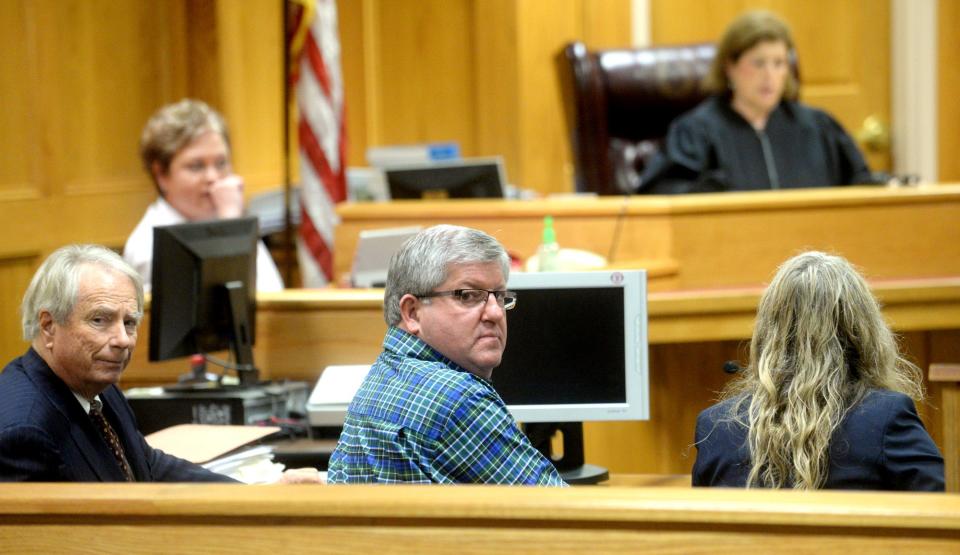 USE THIS PHOTO
Defense attorney Mike Degeurin, left, Bernie Tiede, center, and attorney Jodi Cole, right, during the hearing Tuesday, October 27, 2015, in the 123rd District Court at Panola County Courthouse in Carthage. (Kevin Green/News-Journal Photo)