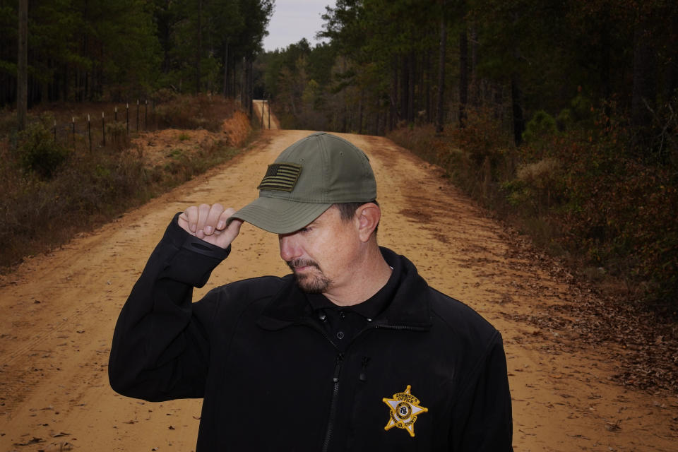 Worth County Sheriff's Lt. Adam Celinski stands for a portrait on Tuesday, Nov. 14, 2023, in Sylvester, Ga. As a sergeant with the Sylvester Police Department in 2016, Celinski responded to a 911 call of a paranoid man banging on the door of a woman’s home. The man, Terrell “Al” Clark, approached Celinski saying he was high and needed help. Celinski’s body-camera video showed he was calm and courteous as he handcuffed the man. Clark also was polite, but neighbors watched as he began to struggle and the officer got Clark facedown on some roadside grass, using a knee and hand to ensure he stayed there. (AP Photo/Brynn Anderson)