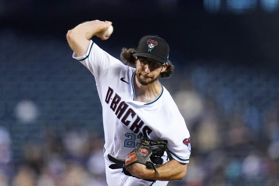 Arizona Diamondbacks starting pitcher Zac Gallen throws a pitch against the San Diego Padres during the first inning of a baseball game Tuesday, June 28, 2022, in Phoenix. (AP Photo/Ross D. Franklin)