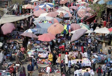 People shop at Al Ataba, a popular market in downtown Cairo, Egypt March 9, 2017. Picture taken March 9, 2017. REUTERS/Mohamed Abd El Ghany