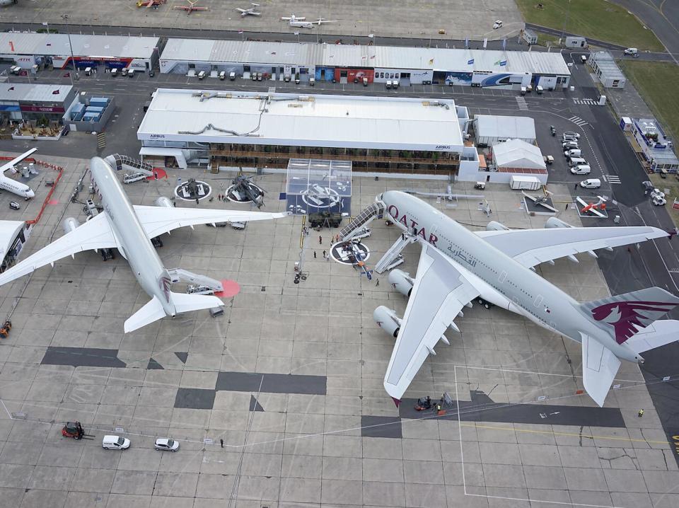 A Qatar Airbus A380 next to a Qatar A350 at the 2017 Paris Air Show.