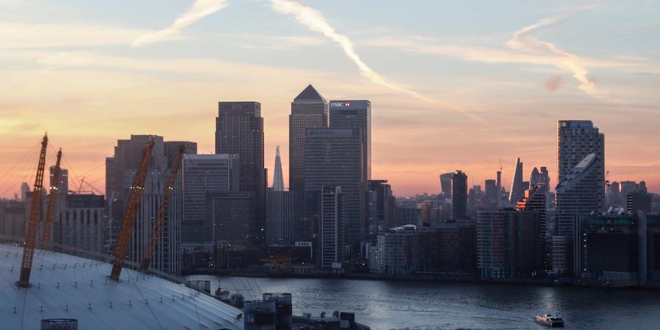 Canary Wharf and the city are seen at sunset in London, December 14, 2016.