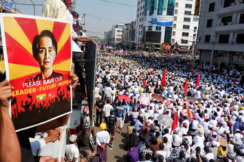 Demonstrators protest a against military coup in Mandalay