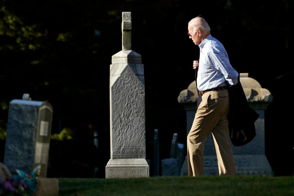 President Joe Biden puts his jacket on as walks to attend Mass at St. Joseph on the Brandywine Catholic Church in Greenville on Saturday, Sept. 16, 2023.