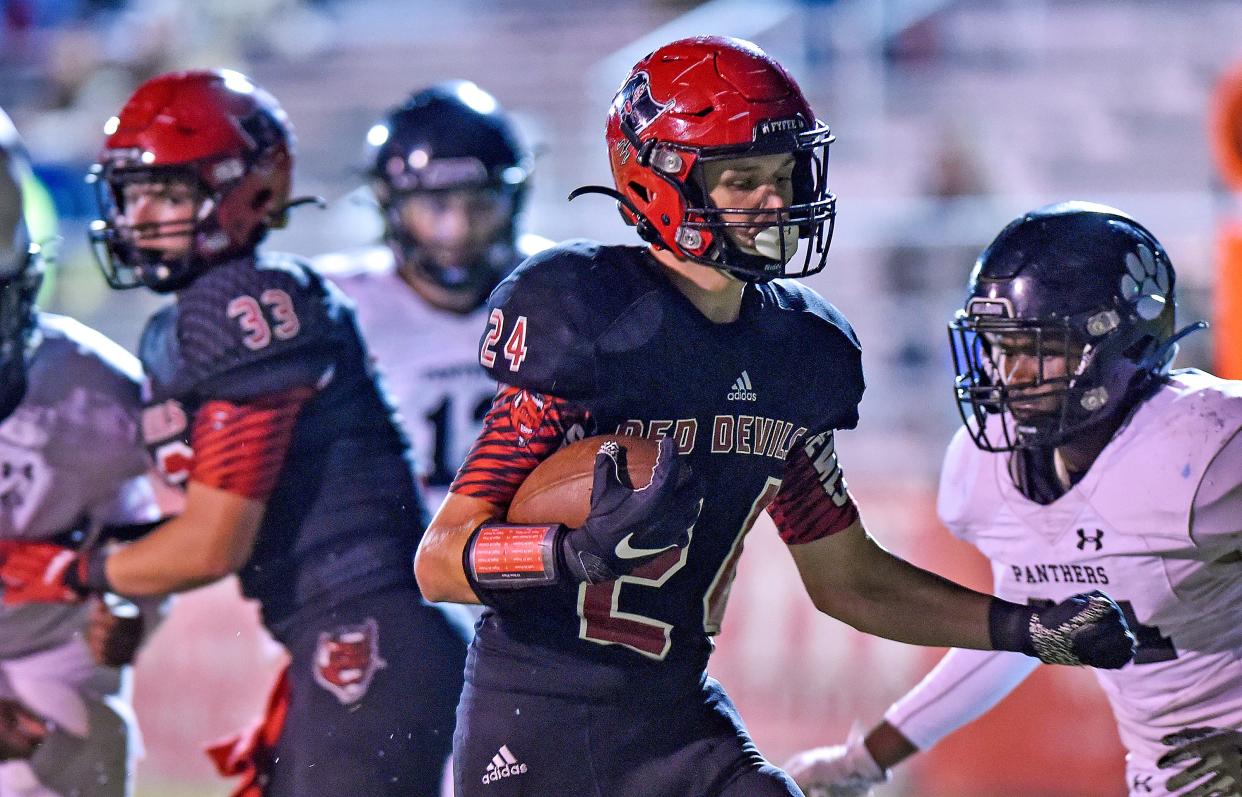 Fyffe's Logan Anderson makes a run during high school football action against Walter Wellborn in Fyffe, Alabama November 5, 2021.