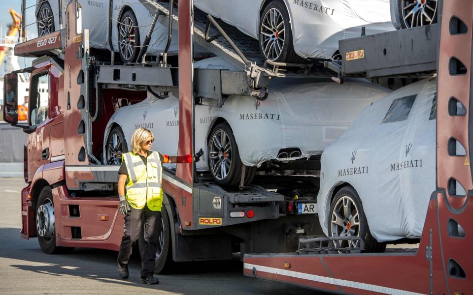 A port employee controls trucks boarding to Britain at the Ferries port of Calais, northern France - Credit: DENIS CHARLET/AFP/Getty Images