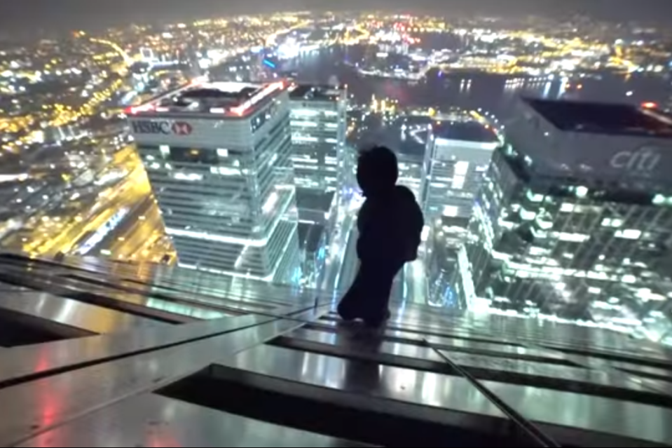 Thrill seekers: Harry Gallagher was filmed scaling London's second biggest building, One Canada Square: Night Scape