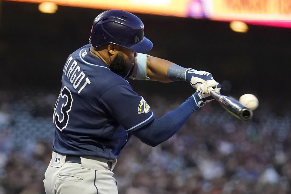Tampa Bay Rays' Manuel Margot hits an RBI single against the San Francisco Giants during the fifth inning of a baseball game in San Francisco, Monday, Aug. 14, 2023. (AP Photo/Jeff Chiu)