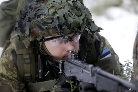 An Estonian army conscript soldier attends a tactical training in the military training field near Tapa, Estonia February 16, 2017. REUTERS/Ints Kalnins