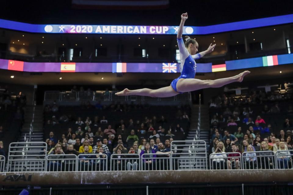 Sarah Voss of Germany performs on the beam during the America Cup gymnastics competition Saturday, March 7, 2020, in Milwaukee. (AP Photo/Morry Gash)