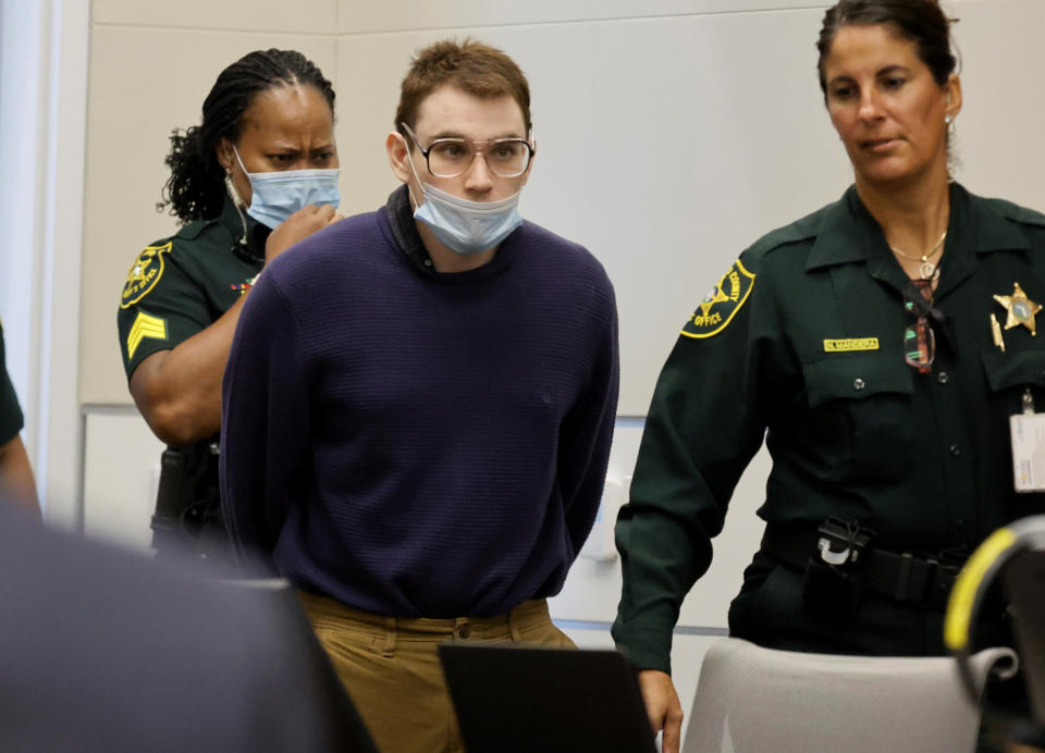 FILE - Marjory Stoneman Douglas High School shooter Nikolas Cruz is led into the courtroom during the penalty phase of his trial at the Broward County Courthouse in Fort Lauderdale, Fla., on Monday, July 25, 2022. (Carline Jean/South Florida Sun-Sentinel via AP, Pool, File)