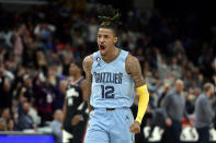 Memphis Grizzlies guard Ja Morant reacts in the second half of an NBA basketball game against the Los Angeles Clippers, Wednesday, March 29, 2023, in Memphis, Tenn. (AP Photo/Brandon Dill)