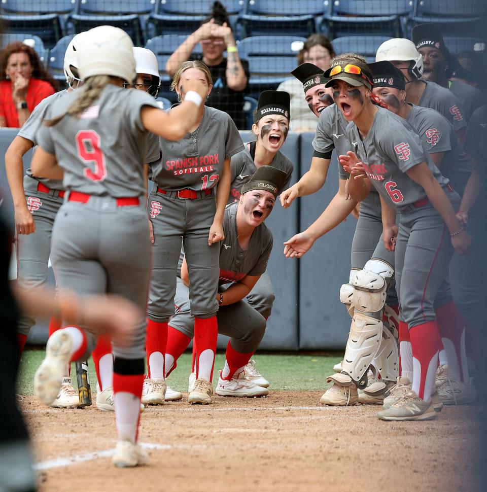 Spanish Fork cheers as Tatum Hall makes her way home after hitting a home run during the 5A softball championship game against Bountiful at the Miller Park Complex in Provo on Friday, May 26, 2023. Spanish Fork won 8-4. | Kristin Murphy, Deseret News