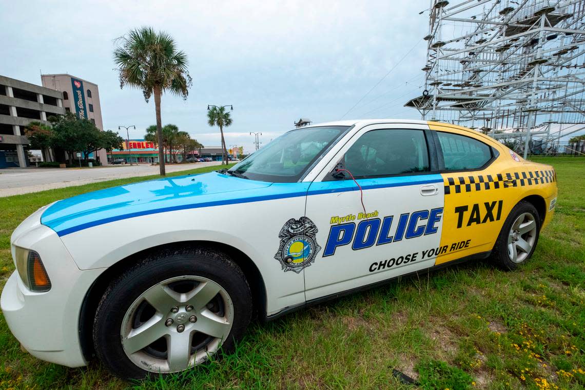 Cars placed around the area by the City of Myrtle Beach has the paint scheme of a police car in the front and a taxi in the back to discourage drinking and driving. Sept. 1, 2022.