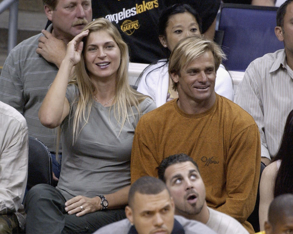 <p>Gabrielle Reece and husband Laird Hamilton attend a Lakers v. Spurs playoff game in 2003. </p>