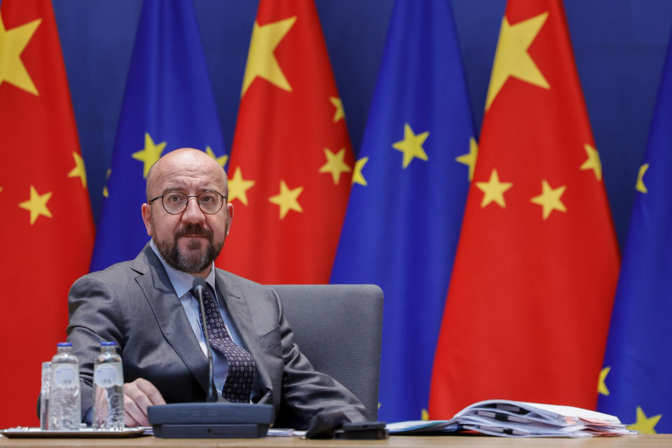 FILE - European Council President Charles Michel arrives to meet with European Union foreign policy chief Josep Borrell and via video-conference, European Commission President Ursula von der Leyen and Chinese President Xi Jinping during an EU China summit at the European Council building in Brussels, Friday, April 1, 2022. China says president and ruling Communist Party leader Xi Jinping was holding talks Thursday, Dec. 1, 2022, with visiting Michel in Beijing, amid frictions over trade, Russia and Taiwan. (AP Photo/Olivier Matthys, Pool)