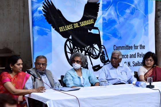 Senior advocate Prashant Bhushan, CPI leader D. Raja, author-activist Arundhati Roy, former DUSU President Nandita Narain, and others during a press conference demanding the immediate release of Saibaba on March 10, 2021 in New Delhi.<span class="copyright">Sanjeev Verma—Hindustan Times/Getty Images</span>