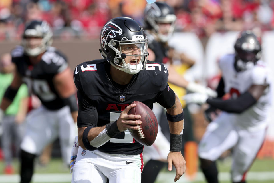 Atlanta Falcons quarterback Desmond Ridder (9) runs out of the pocket against the Tampa Bay Buccaneers during the second half of an NFL football game, Sunday, Oct. 22, 2023, in Tampa, Fla. (AP Photo/Mark LoMoglio)