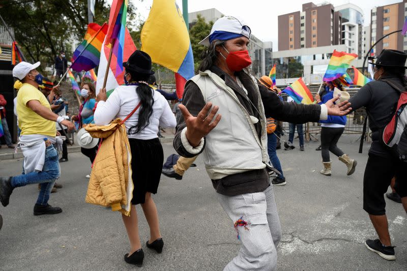 Members of indigenous communities and supporters of Ecuador's presidential candidate Yaku Perez gather outside the Electoral National Council (CNE) in Quito