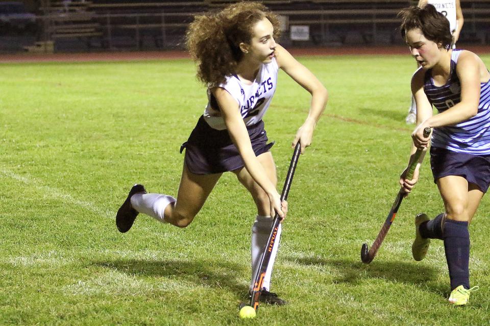 Essex's Kaitlyn Corbin looks up the field for a place to pass during the Hornets 5-0 home win over Mount Mansfield earlier this season.