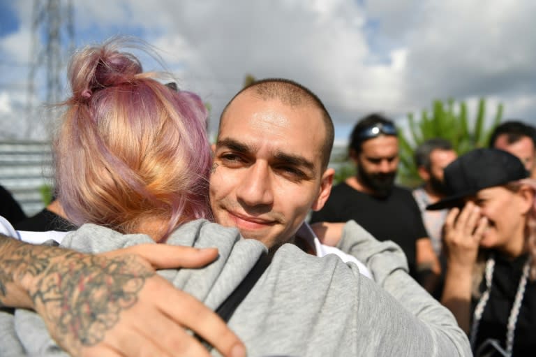 Popular Turkish rapper "Ezhel" was hugged by loved ones after a court freed him from charges of encouraging drug on the first day of a trial that sparked widespread alarm usset he was released, on June 19, 2018 in Istanbul.An Istanbul court acquitted "Ezhel", a popular Turkish rapper who faced up to 10 years in jail on charges of encouraging drug use, activists and lawyers said, on the first day of a trial on June 19, 2018, that had sparked widespread alarm. "Ezhel" was arrested at the end of May, 2018 in Istanbul by anti-narcotics police and his case was seen by rights groups as an example of declining freedom of expression under Turkish President