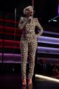 <p>She wore a leopard print Sergio Hudson jumpsuit and matching beret with Casadai pumps and oversized Gucci sunglasses. <i>[Photo: Getty]</i> </p>