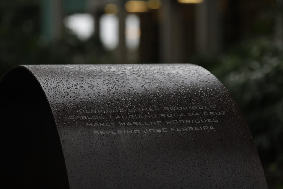 The names of COVID-19 victims are etched on the Infinity Memorial at the Penitencia cemetery in Rio de Janeiro, Brazil, Sunday, Sept.20, 2020. The three-ton memorial was inaugurated inside a cemetery where many of Rio de Janeiro's COVID-19 victims have been buried. (AP Photo/Silvia Izquierdo)