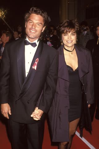 <p>Ron Galella/Ron Galella Collection via Getty</p> Harry Hamlin and Lisa Rinna early in their relationship