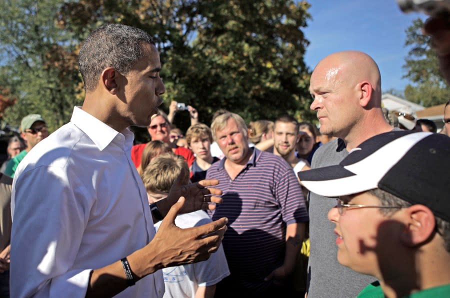 FILE – Democratic presidential candidate, U.S. Sen. Barack Obama, D-Ill., left, answers a question from Joe Wurzelbacher, also known as “Joe the Plumber,” right, in Holland, Ohio, Oct. 12, 2008. (AP Photo/Jae C. Hong, File)