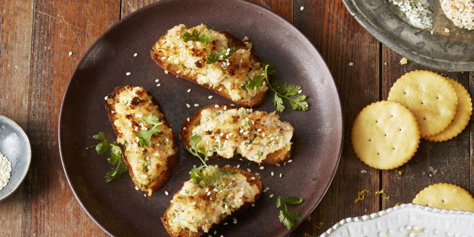 <p>Give this classic appetizer an upgrade with fresh ginger, cilantro and jalapeños.</p><p>Get the <strong><a href="https://www.goodhousekeeping.com/food-recipes/easy/a35162/gingery-shrimp-toasts/" rel="nofollow noopener" target="_blank" data-ylk="slk:Gingery Shrimp Toasts recipe;elm:context_link;itc:0;sec:content-canvas" class="link ">Gingery Shrimp Toasts recipe</a></strong>.</p>