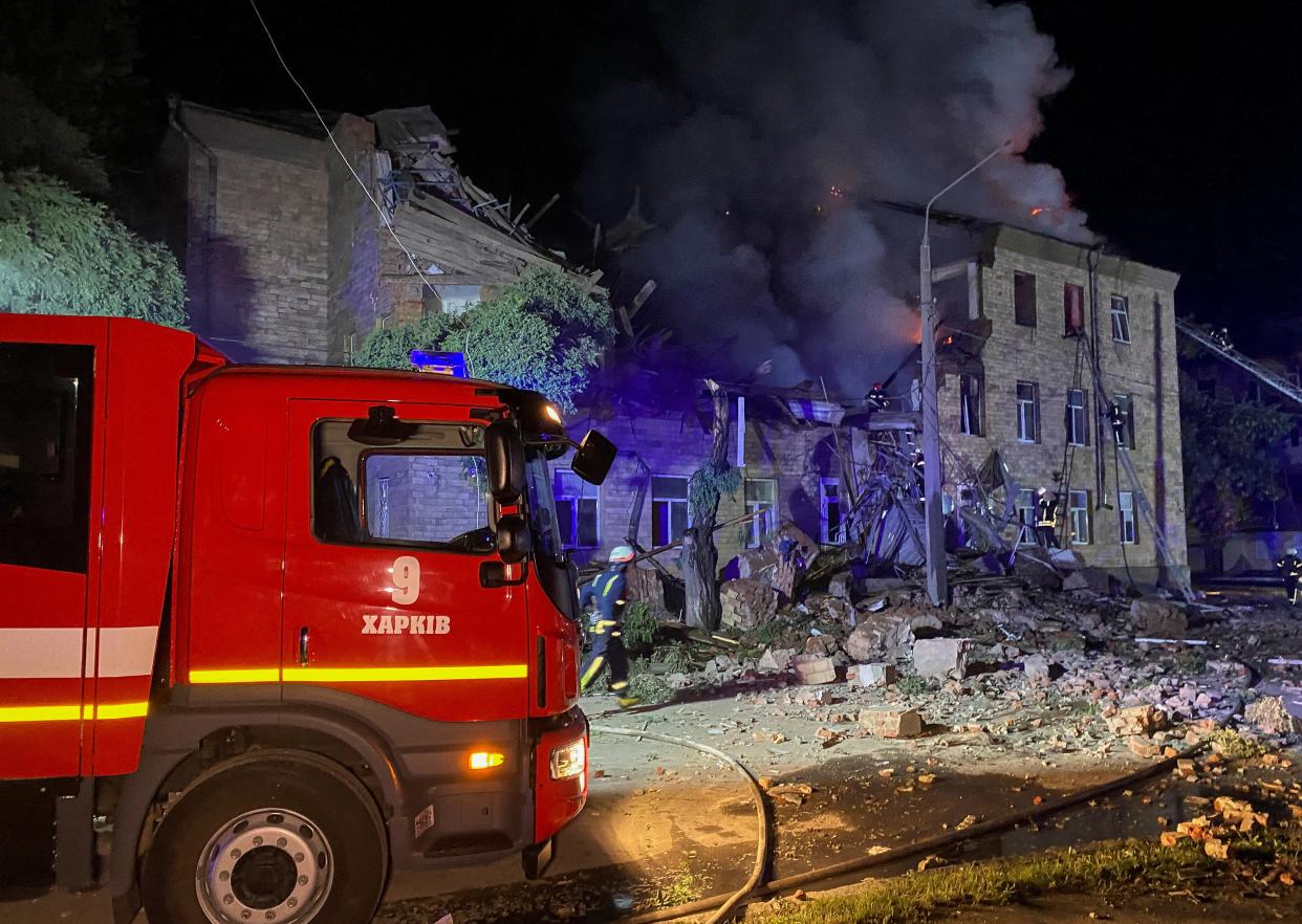 Rescuers work at a site of a building damaged by a Russian drone strike, amid Russia's attack on Ukraine, in Kharkiv, Ukraine August 1, (REUTERS)