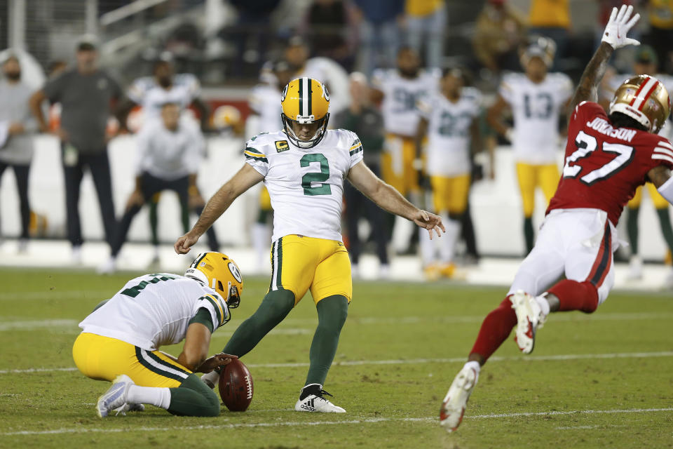 Green Bay Packers kicker Mason Crosby (2) kicks the game winning field goal as time expires in the fourth quarter against the San Francisco 49ers during an NFL football game, Sunday, Sep. 26, 2021 in Santa Clara, Calif. (AP Photo/Lachlan Cunningham)