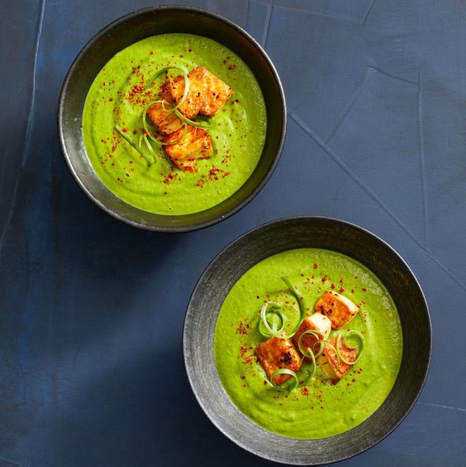 green soup with crispy tofu in a bowl