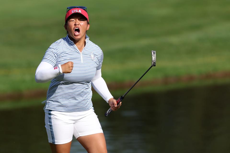 GAINESVILLE, VIRGINIA - SEPTEMBER 14: Megan Khang of Team United States reacts to her eagle putt on the 14th green during the Saturday Fourball matches against Team Europe during the second round of the Solheim Cup 2024 at Robert Trent Jones Golf Club on September 14, 2024 in Gainesville, Virginia. (Photo by Gregory Shamus/Getty Images)