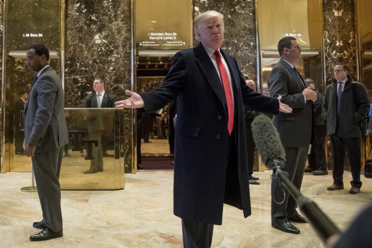 President-elect Donald Trump speaks to members of the media in the lobby at Trump Tower in New York, Tuesday, Dec. 6, 2016. (Photo: Andrew Harnik/AP)