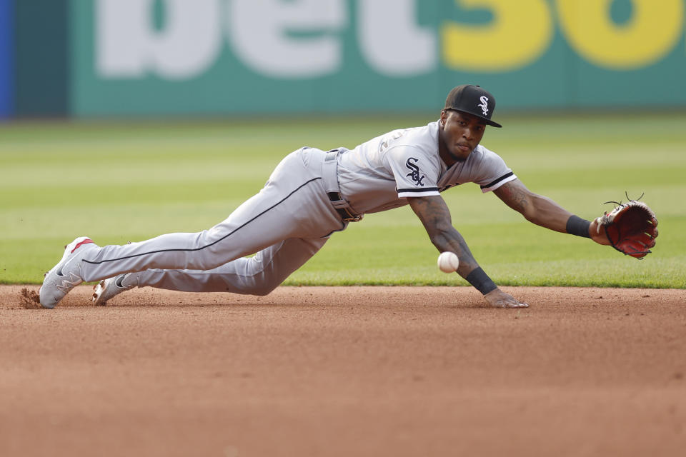 Chicago White Sox shortstop Tim Anderson makes a diving stop on a single by Cleveland Guardians' Andres Gimenez during the fourth inning of a baseball game Tuesday, May 23, 2023, in Cleveland. Anderson threw out Josh Bell at home. (AP Photo/Ron Schwane)