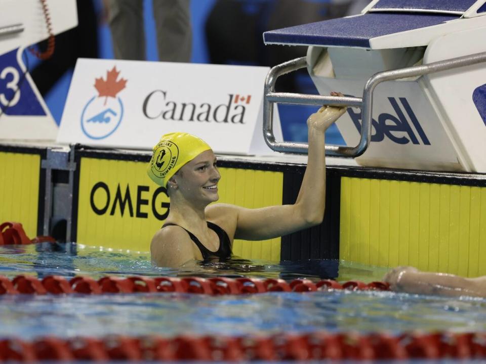 Summer McIntosh powered her way to a time of 4:25.87 in the 400-metre individual medley to break Katinka Hosszú's seven-year record on Saturday at the Canadian swimming trials in Toronto. (Michael P. Hall/Swimming Canada - image credit)