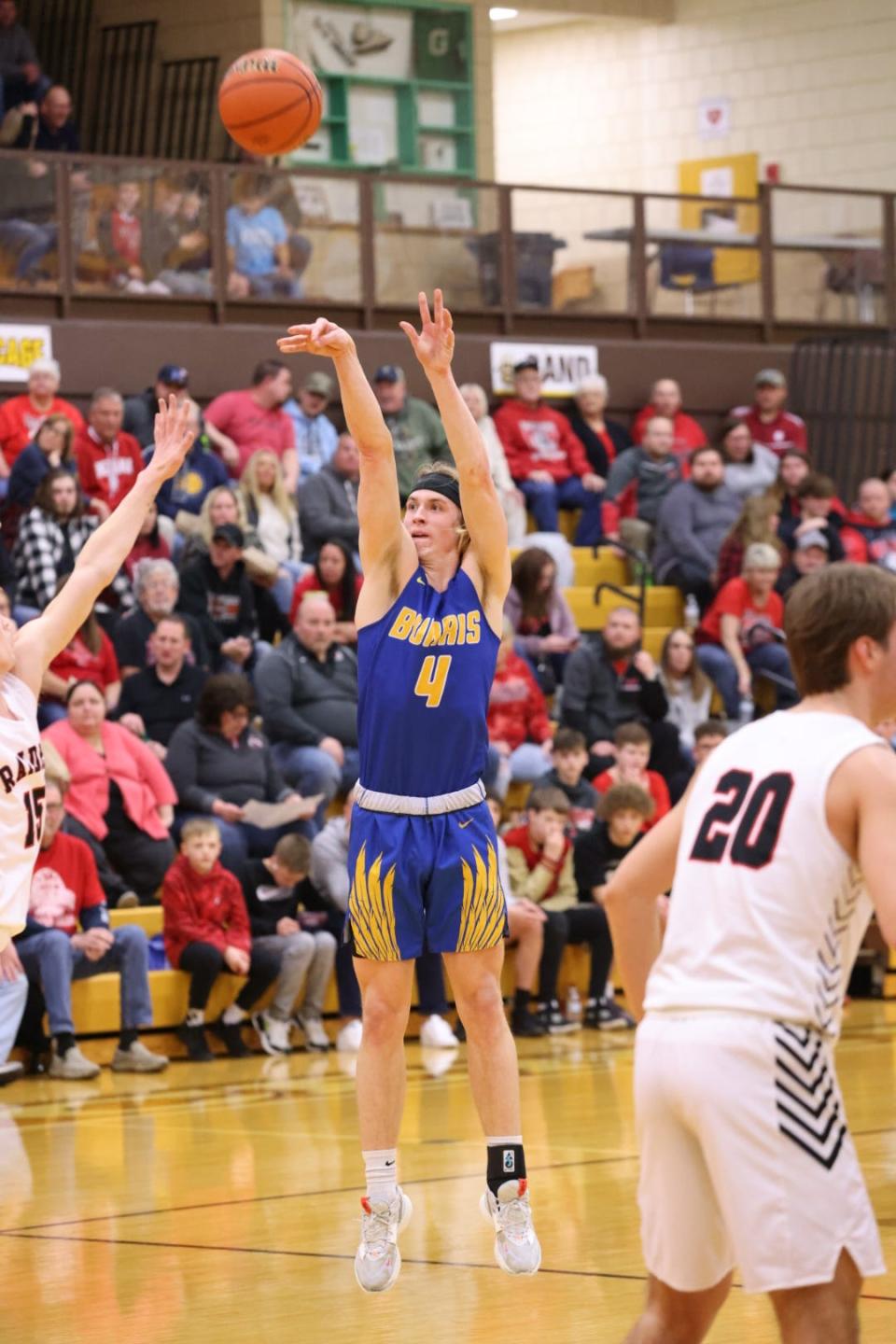 Muncie Burris boys basketball's Bryce Karnes shoots a jumper in the team's sectional championship game against Wapahani at Monroe Central High School on Saturday, March 4, 2023.