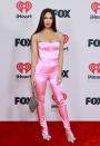 <p>Of course, Megan's Barbie pink Mach & Mach jumpsuit still lives in our heads rent-free. There's no scrimping on attention to detail, with even the straps perfectly matching the bows on her stilettos.</p>