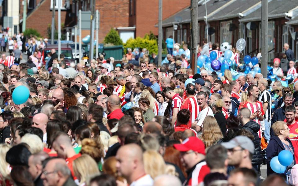 Mourners line the streets ahead of the funeral of Bradley Lowery - Credit: Owen Humphreys/PA Wire