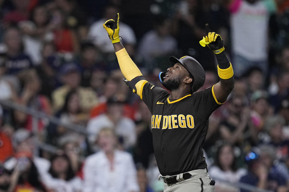 San Diego Padres' Jurickson Profar celebrates after hitting a two-run home run during the fourth inning of a baseball game against the Houston Astros, Saturday, Sept. 9, 2023, in Houston. (AP Photo/Kevin M. Cox)