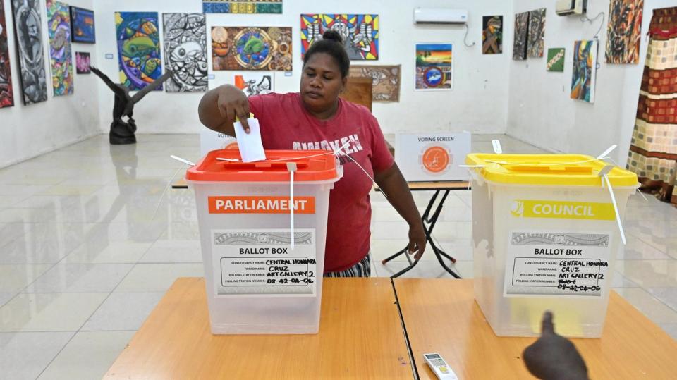 Esther Maeluma casts her ballot in Honiara