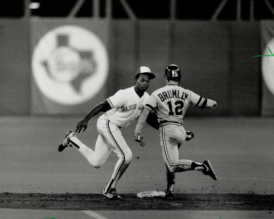 June 9, 1989: Tony Fernandez glides towards second; beating Detroit's Mike Brumley to the bag and applying the tag in early-inning action at the SkyDome. (Photo by Mike Slaughter/Toronto Star via Getty Images)