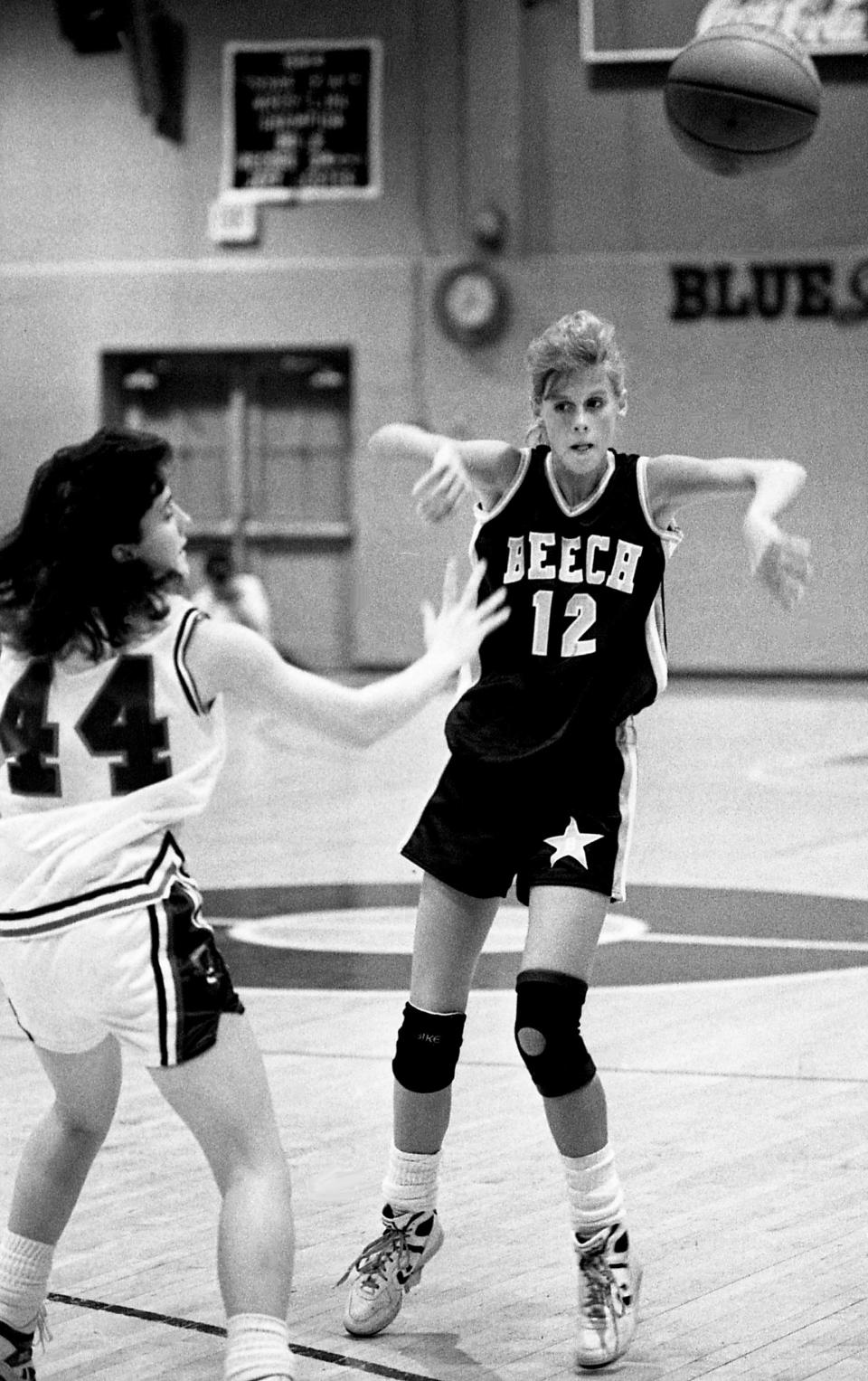 Kristi Cushenberry, Beech High (1985-88): Here, Cushenberry (12) gets her pass off past Lebanon High defender Christy Chambers (44) during the final of the Middle Tennessee Invitation Tournament in Lebanon, Tenn., on Dec. 30, 1987.