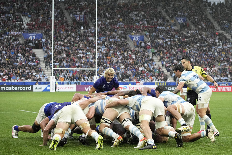 Samoa's Jonathan Taumateine looks on as the teams scrum down during the Rugby World Cup Pool D match between Argentina and Samoa at the Stade Geoffroy Guichard in Saint-Etienne, France, Friday, Sept. 22, 2023. (AP Photo/Laurent Cipriani)