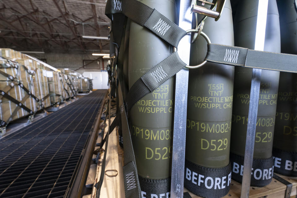 FILE - Pallets of 155 mm shells ultimately bound for Ukraine are loaded by the 436th Aerial Port Squadron, April 29, 2022, at Dover Air Force Base, Del. As the war rages on in Ukraine, the United States is doing more than supporting an ally. It's learning lessons — with an eye toward a possible clash with China. (AP Photo/Alex Brandon, File)
