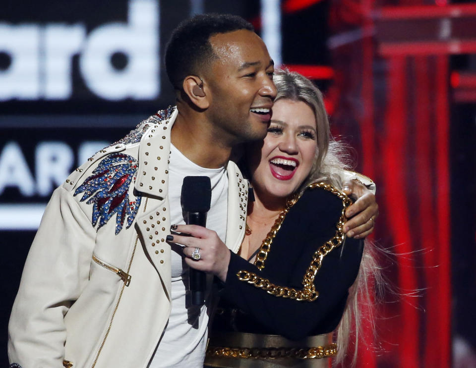 John Legend and Kelly Clarkson's cover of "Baby, It's Cold Outside" has been slammed as "absurd" by Dean Martin's daughter. (Photo: REUTERS/Mario Anzuoni)