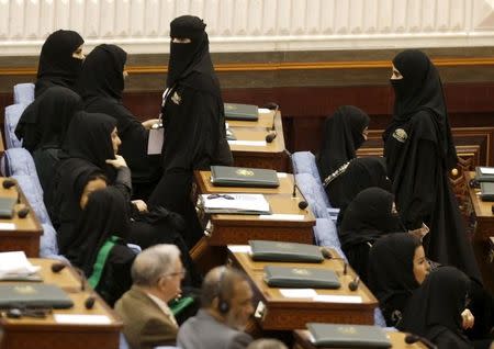 Saudi women members of the Saudi Shura Council attend a session chaired by Saudi Arabia's King Salman, in Riyadh December 23, 2015. REUTERS/Faisal Al Nasser - GF10000274672