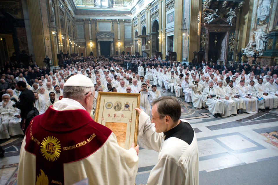 In this photo provided by the Vatican paper L'Osservatore Romano, Pope Francis celebrates a mass with the Jesuits on the occasion of the order's titular feast, in Rome's Jesus' Church, Friday, Jan. 3, 2014. (AP Photo/Osservatore Romano, ho)